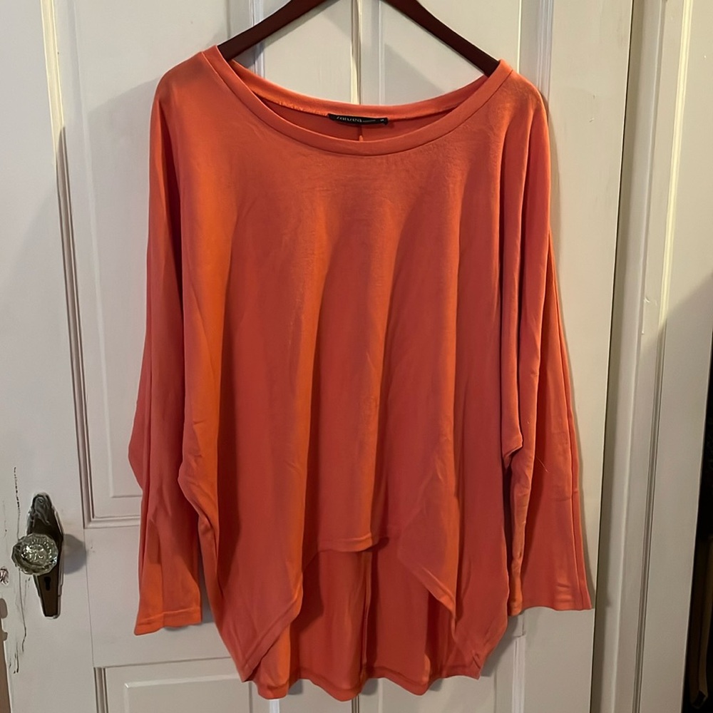 Bright salmon colored tunic. Size medium.